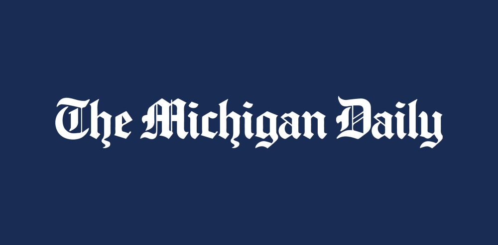 "The Michigan Daily" written in white on a blue background